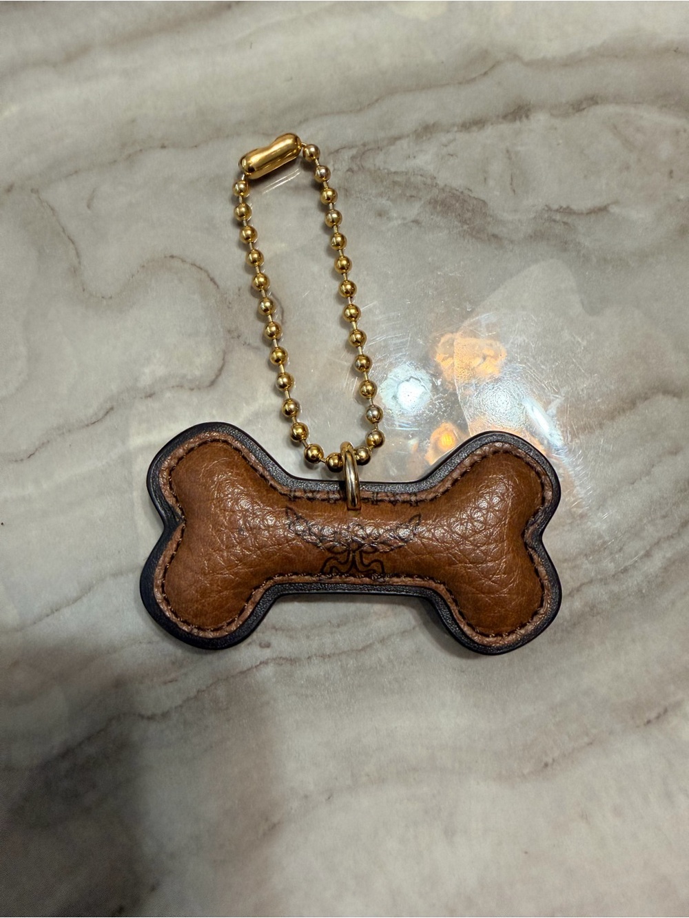 MCM Brown Leather Bone-Shaped Dog Tag Charm with Gold Chain
